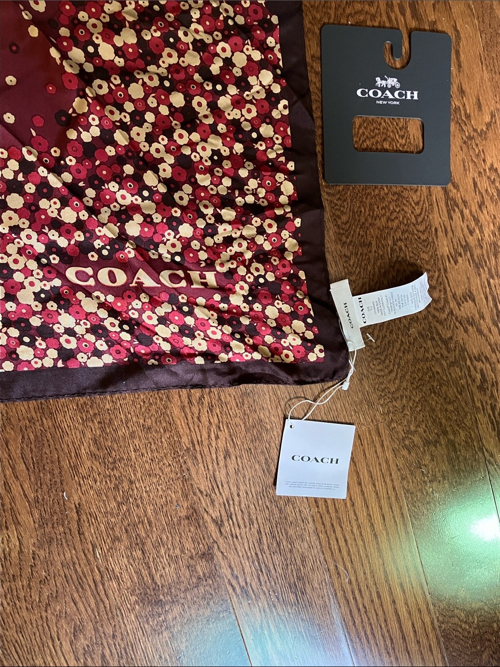 COACH Burgundy Floral Coach-Print Throw Blanket
